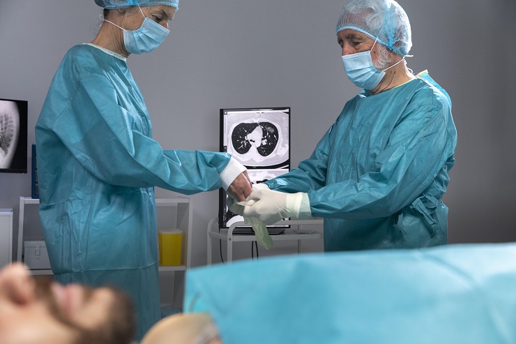 Vascular specialist performing minimally invasive procedure